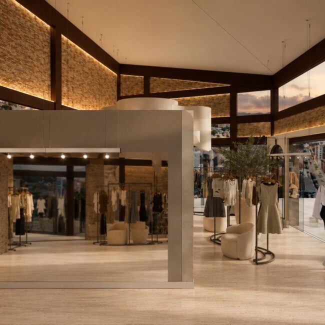 Projeto interior loja Branca Boutique Itaipava Petrópolis provador araras manequim parede tijolo iluminação vista cidade